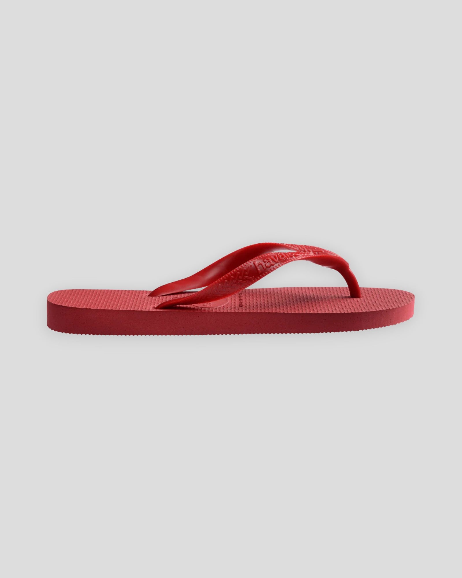 Røde Havaianas sandaler til kvinder med flade såler og justerbar rem, perfekt til sommerferie og afslappede dage.