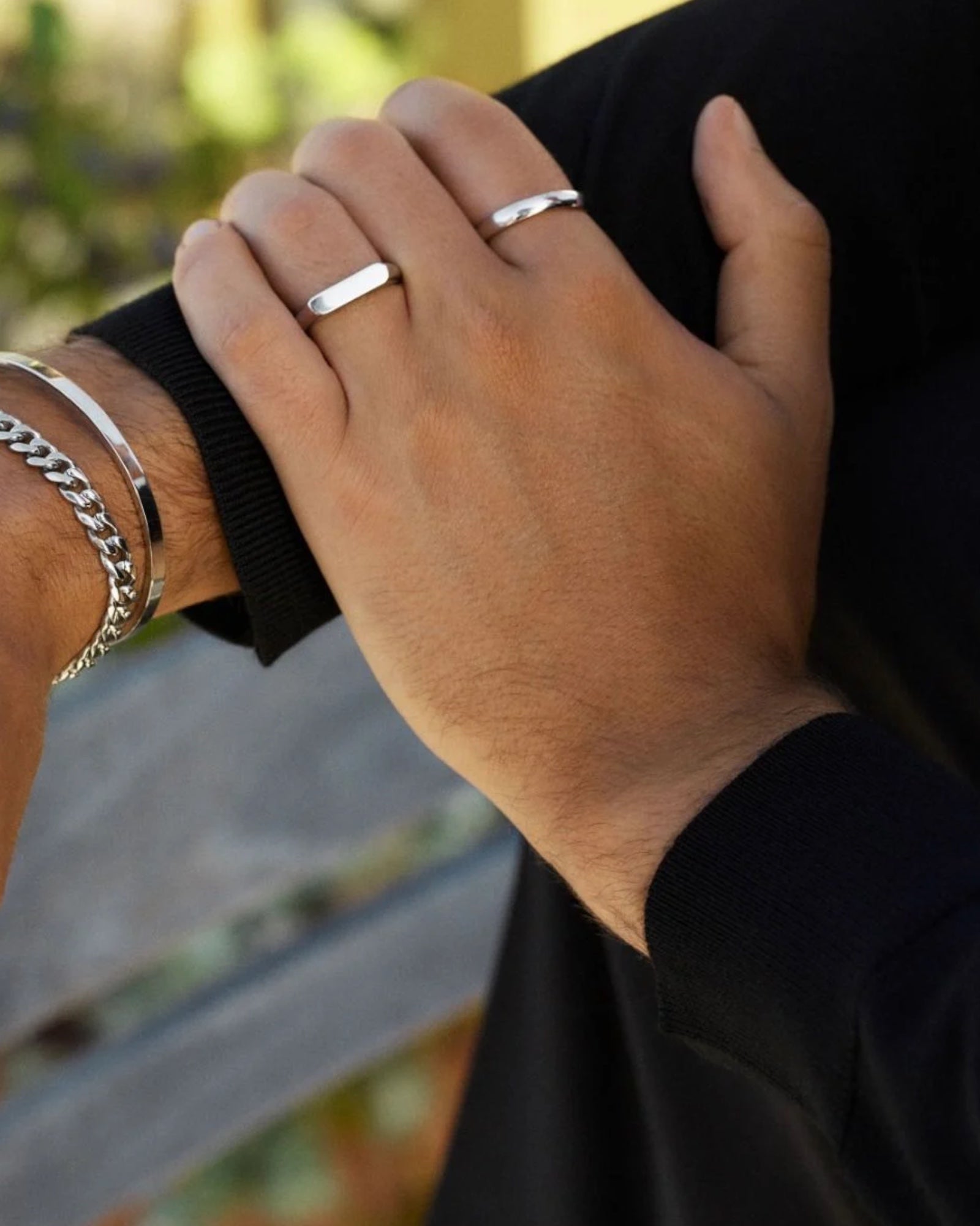 Silver men's infinity ring by Edblad featuring a sleek, modern design with a polished finish on a plain background.