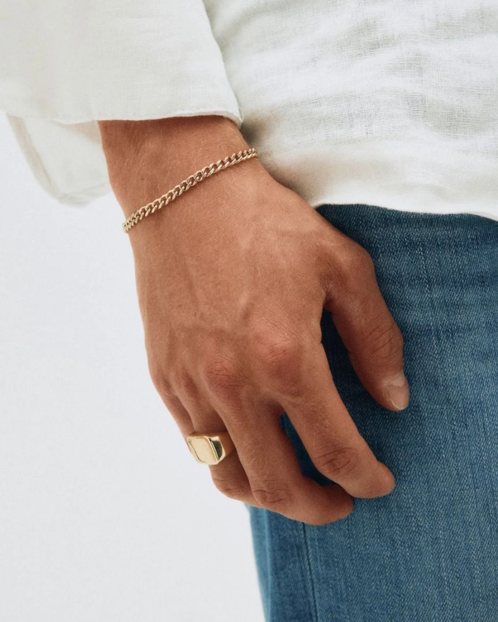 Edblad Ellis Signet Ring in gold, a stylish men's ring with a smooth, polished finish, perfect for everyday wear.