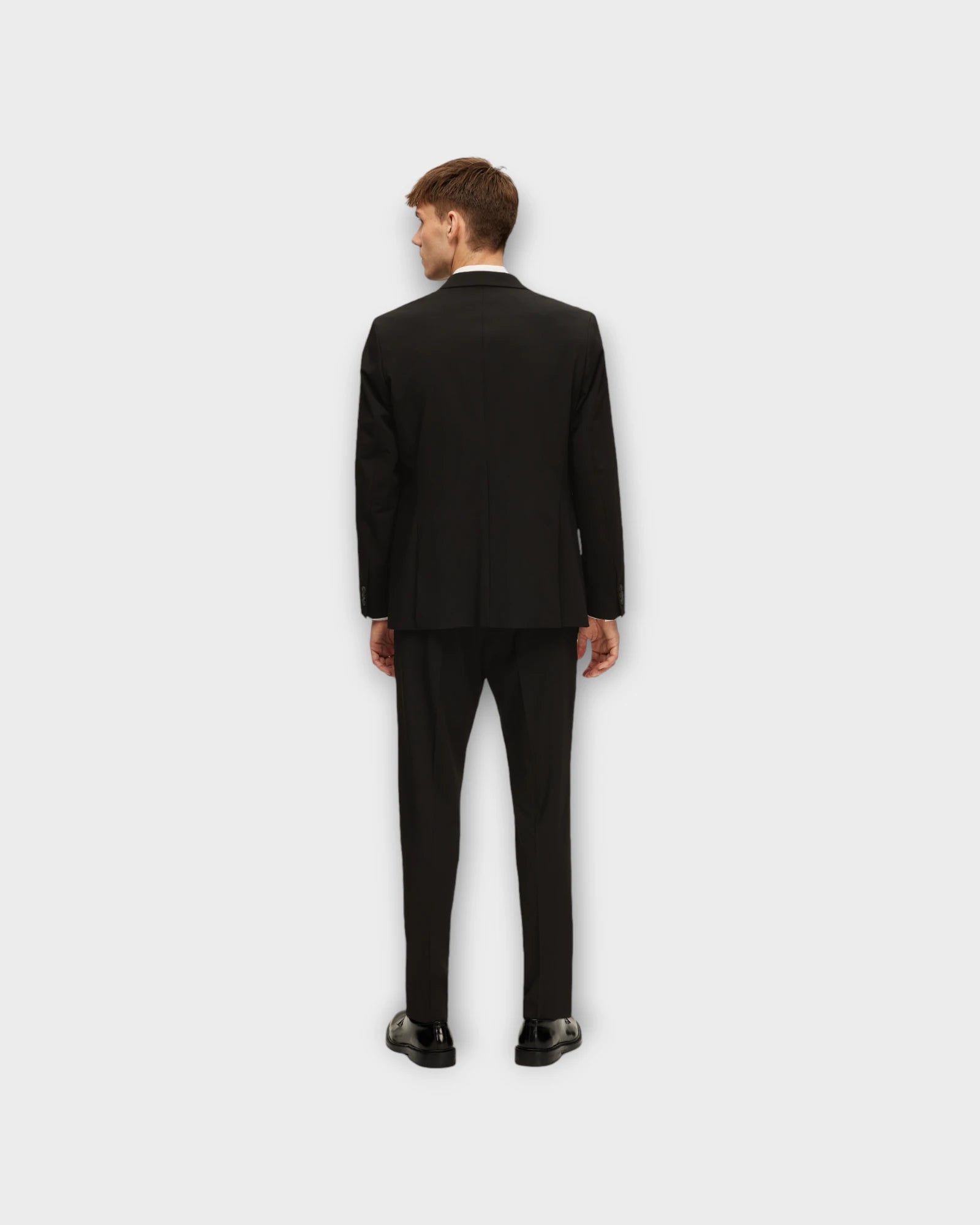 Slim Liam Blazer Flex Black - Sort Selected Homme Slim Fit Herre Blazer . Her set på model bagfra.