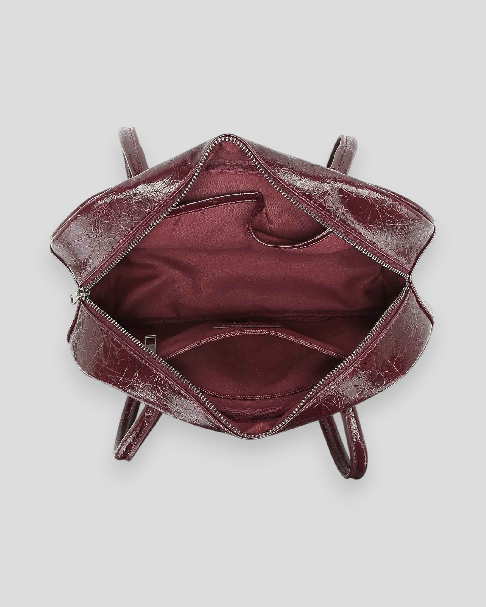 Noella Iris Bag in Burgundy, a stylish women's handbag with sleek design and elegant leather finish.