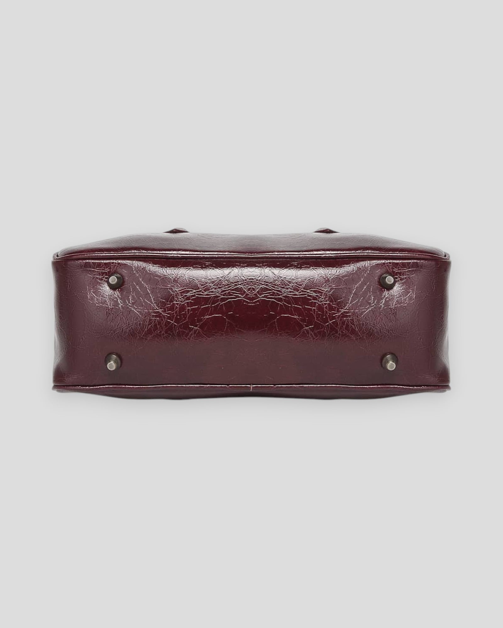 Noella Iris Burgundy women's bag with structured design and adjustable strap, stylish accessory for everyday use.